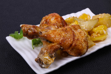 Roasted chicken legs with potato