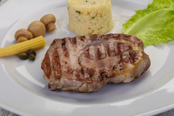 Grilled pork neck steak