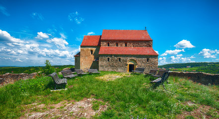 Fototapeta na wymiar Fortified Lutheran Church St. Michael on top of rock hill in Cisnadioara near Sibi