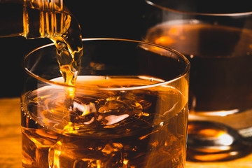 whiskey glass and whiskey