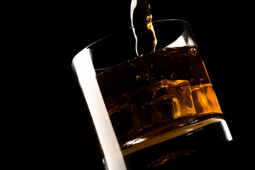whiskey glass and whiskey