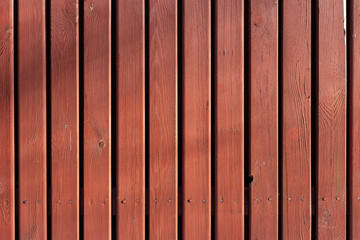Fototapeta premium texture of a red wooden fence