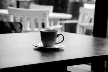 cup of coffee on table in cafe
