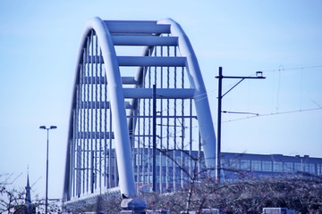 Steel suspension bridge over Motorway A12 named Nootdorpboog. This bridge is created for the NS Railways to go maintenance plant in Leidschendam