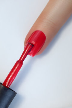 Red Finger Nail Point Isolated White Background With Nail Polish. Painting Nails.