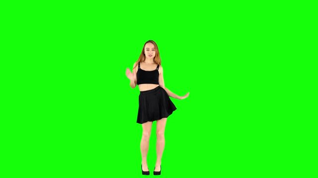 Cute Schoolgirl in Black Skirt Spinnig and Dancing on Green Screen