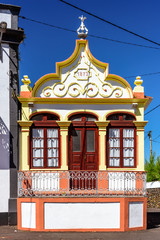ancient yellow house in terceira view of the exterior of one of the oldest houses in azore islands. biscoitos, terceira, portugal