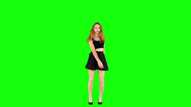 School Girl Spinning Her Skirt While Dancing Green Screen