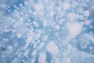 Winter Lake Minnewanka, Abraham, Methane bubbles,lifestyle, Travel Alberta, Canadian Rockies,Banff National Park,Icefiled Parkways