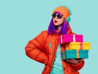 girl with purple hair with headphones and gifts