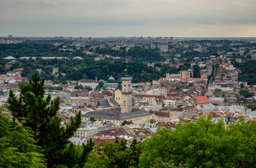 Fototapeta na wymiar LVIV/UKRAINE-: Top view from of the Vysokyj castle in Lviv, Ukraine. Lviv bird's-eye view. Lviv old town from above. Aerial view of Latin Cathedral.