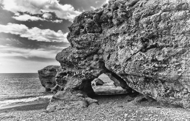 beach on Crete island with rocks, b/w, Greece, Europe. Crete is the largest and most populous of the Greek islands.