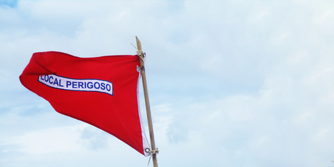 flag in front of blue sky