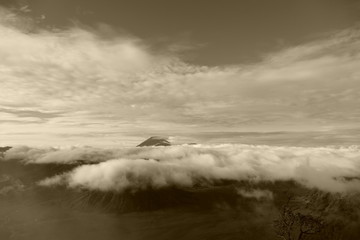 The delightful volcanic complex Bromo Tengger Semeru National Park against the background of fascinating views of nature, sky, craters and clouds