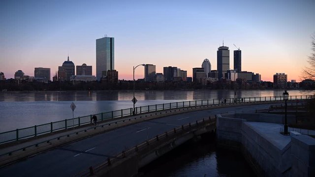 Time lapse of the Boston skyline during sunset overlooking the Charles River