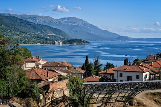 Coast of Lake Ochrid seen from Ochrid City. Ohrid and Lake Ohrid are UNESCO natural and cultural heritage sites. Typical Macedonian architecture. Amphitheater and old town.