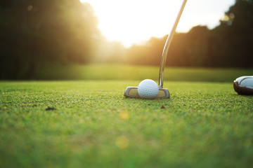 Golfers are putting golf in the evening golf course golf backglound in Thailand