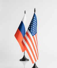 The flags of the USA and Russia on a white background isolated. The concept of policy