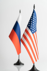 The flags of the USA and Russia on a white background isolated. The concept of policy