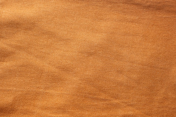 light brown dented jeans background
