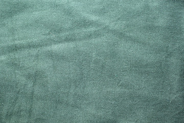 turquoise dented jeans background