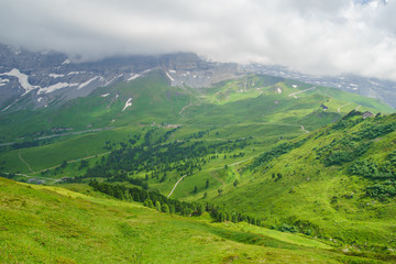 Naklejka na ściany i meble Alpine peaks landskape background. Jungfrau, Bernese highland. Alps, tourism, journey, hiking.