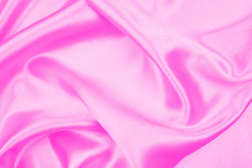 Smooth elegant pink silk or satin texture can use as abstract background, fabric