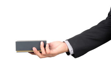 Businessman hand holding a gift box to deliver on isolated with clipping path.