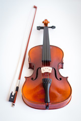 Fototapeta na wymiar Violin in white background with bow