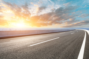 Empty asphalt road and modern city skyline with buildings in Shanghai,China