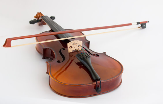 Violin in white background with bow
