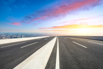Fototapeta premium Empty asphalt road and modern city skyline with buildings in Shanghai,China