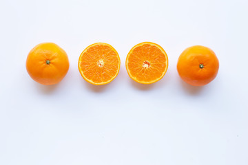 Fresh orange citrus fruit on white.