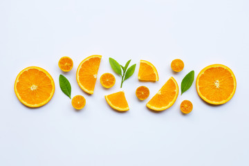 High vitamin C. Fresh orange citrus fruit with leaves isolated on white.