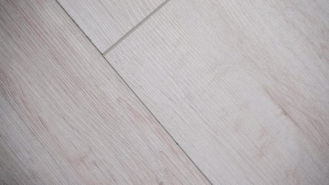 Textures and patterns concept. Detailed close up of bright wooden boards panel floor texture background