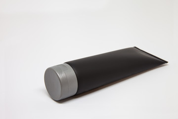 black tube with gray cap