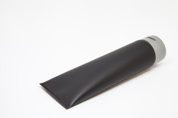 black tube with gray cap