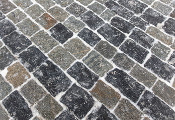 The stone blocks cleared of snow as a background