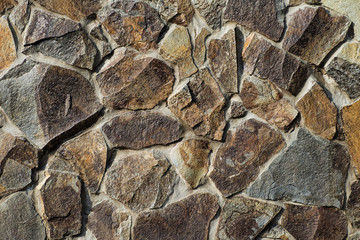 Texture of a stone wall. Old castle stone wall texture background. Part of a stone wall, for background or texture