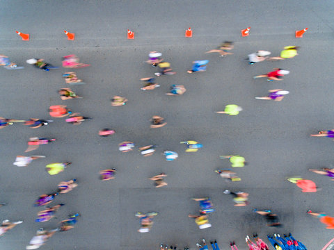 aerial view of marathon runners on the road