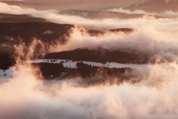 Fantastic winter landscape in snowy mountains. Inversion weather. Christmas holiday concept. Praded, Jeseniky mountains, Czech republic, Europe. Beautiful panorama