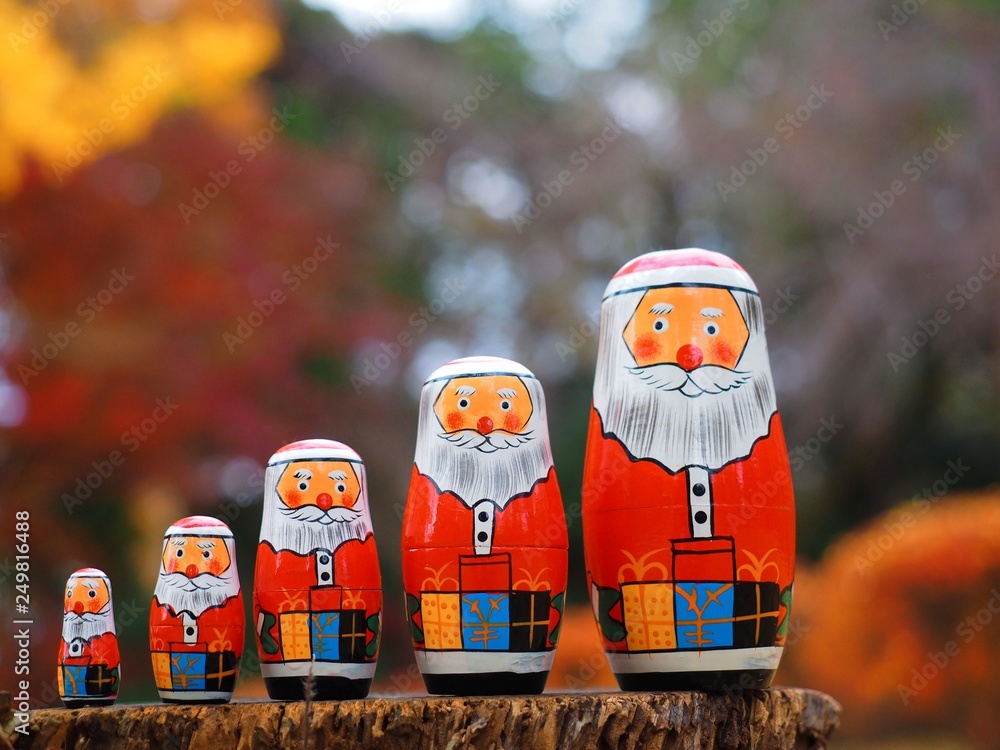 Wall mural Santa Claus Matryoshka,Russian folk toys in forest