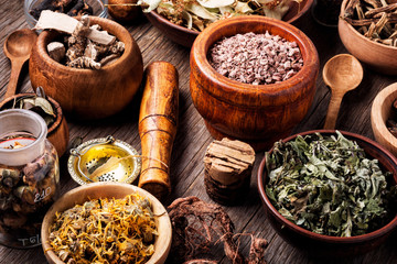 Healing herbs on wooden table © nikolaydonetsk
