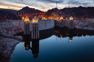 Hoover Dam at Lake Mead at night on the border of Nevada and Arizona in southwestern United States is considered the eigth wonder of the world. © Mcdonojj