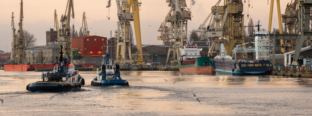 tugs going to work in the port