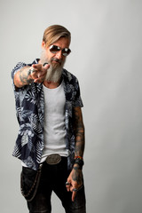 Portrait of an attractive cheerful man with a beard