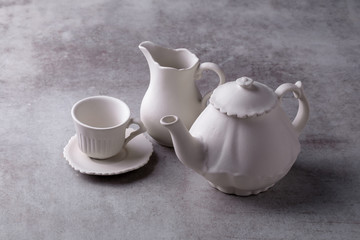Teapot creamer, Cup and saucer on Cement Board