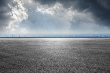 Empty asphalt road and city skyline in Shanghai,high angle view
