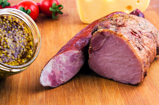 Meat, sausage, cheese with french mustard