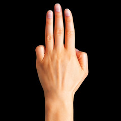 Female hand showing three fingers and palm